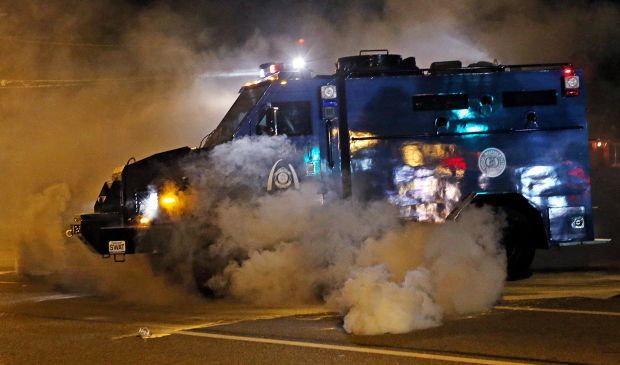 Police tear gas protesters again